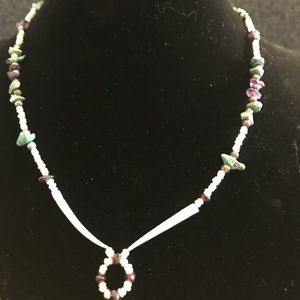 Beaded necklace with porcupine needles